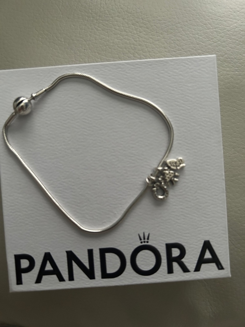 Pandora Sterling Silver Bracelet with three sterling silver charms - Picture 4 of 5